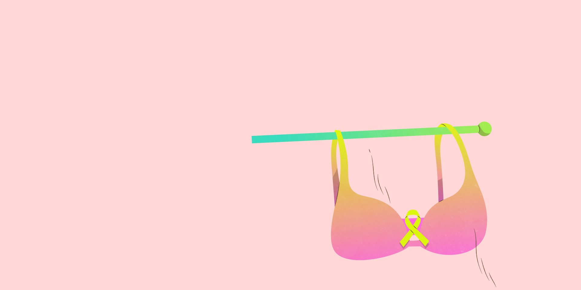 Soutien gorge rose suspendu à une aiguille à tricoter